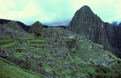 View of the Machu Picchu ruins and Huayna Picchu from the agricultural terraces. 