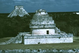 Chichen Itza.  View of the Caracol in the foreground, the Castillo dominating the left background and the Temple of the Columns.