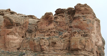Chacoan stairway cut into this cliff, left of center, connected the wash area  across from Chetro Ketl with the Tsin Kletso mesa